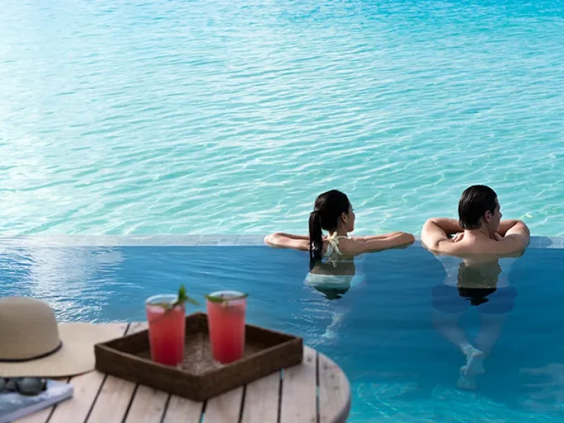 adhi_couple_in_pool_944x510px